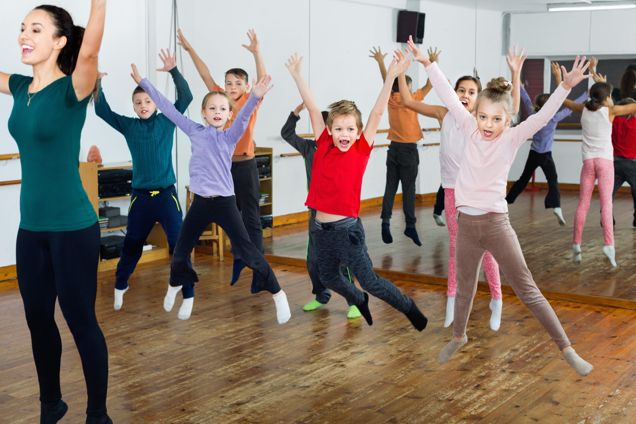 Primary School Children enjoying themselves in a dance club - example of how to use PE and Sports Premium